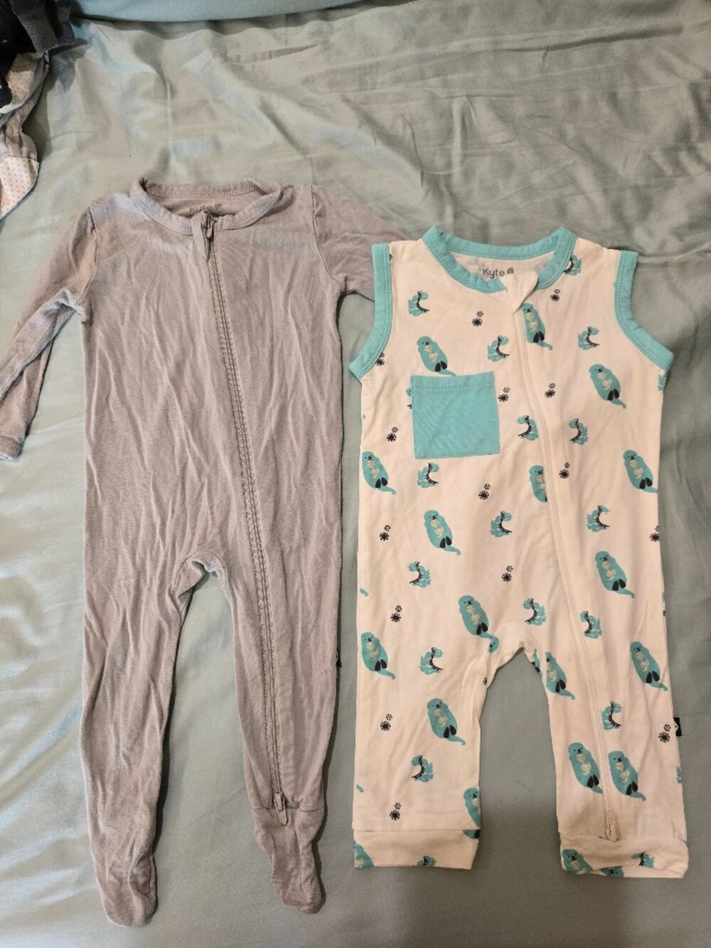 Kyte 3-6 month romper, pj, and an extra bamboo sleeper from Angel Baby